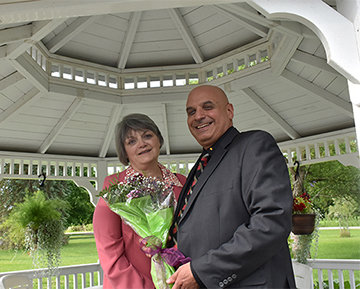 Beth Korb, left, the manager of perioperative services, was honored for 40 years of service at Wayne Memorial. She’s pictured with hospital CEO James Pettinato, right. ..